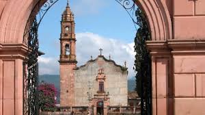 Church viewed through arch
